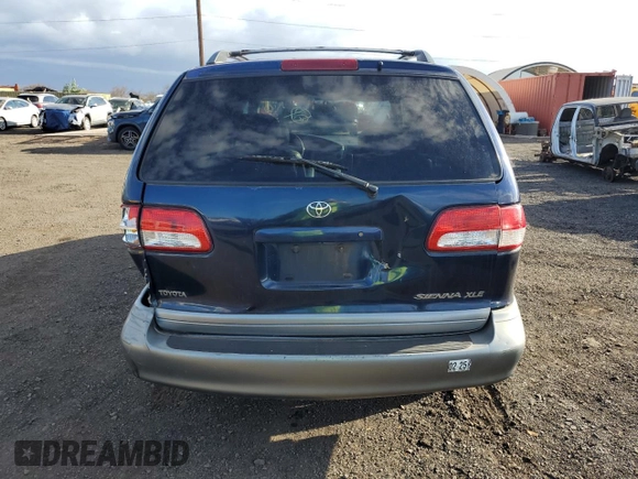 2001 Toyota Sienna LE with VIN 4T3ZF13C91U355926, listed as a Copart auction lot 88992805 with 130,397 mi miles and Salvage title. Bid and sale history available at DreamBid. Image 6.
