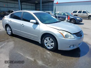 2010 Nissan Altima 2.5 S with VIN 1N4AL2AP5AN513631, listed as a IAAI auction lot 42014908 with 205,798 mi miles. Bid and sale history available at carsss.com. Image 1.