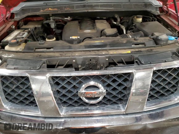 2005 Nissan Titan SE z VIN 1N6AA06BX5N502595, wystawiony jako Copart lot #85888184 z przebiegiem 231 851 mil mil oraz Nie do naprawy • Non repairable. Historia ofert i sprzedaży dostępna na DreamBid. Obrazek 12.