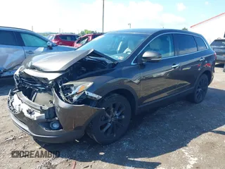 2015 Mazda CX-9 Grand Touring z VIN JM3TB3DV8F0465155, wystawiony jako IAAI lot #42366636 z przebiegiem 125 407 mil mil oraz . Historia ofert i sprzedaży dostępna na DreamBid. Obrazek 2.