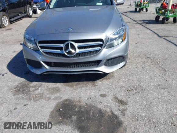 2016 Mercedes-Benz C 300 Luxury with VIN 55SWF4KB7GU138417, listed as a IAAI auction lot 41696331 with 90,879 mi miles and . Bid and sale history available at DreamBid. Image 6.