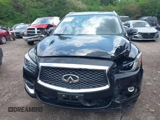 2020 Infiniti QX60 LUXE with VIN 5N1DL0MM8LC516594, listed as a IAAI auction lot 42136299 with 92,747 mi miles. Bid and sale history available at carsss.com. Image 6.