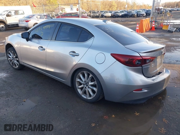 2014 Mazda 3 S Grand Touring with VIN JM1BM1W38E1184450, listed as a IAAI auction lot 40954511 with 157,036 mi miles and . Bid and sale history available at DreamBid. Image 3.