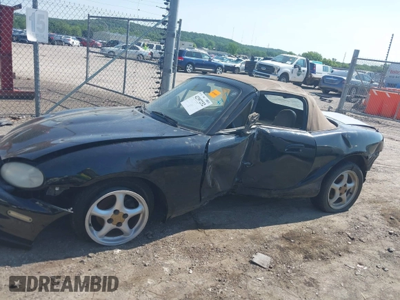 1999 Mazda MX-5 Miata with VIN JM1NB3539X0112181, listed as a IAAI auction lot 42397232 with 11 mi miles and . Bid and sale history available at DreamBid. Image 14.