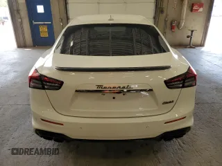 2023 Maserati Ghibli Modena z VIN ZAM57YSMXPX411516, wystawiony jako Copart lot #58330765 z przebiegiem Nie podano mil oraz Szkoda całkowita • Salvage title. Historia ofert i sprzedaży dostępna na DreamBid. Obrazek 6.