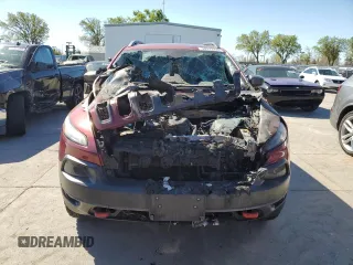 2016 Jeep Cherokee Trailhawk z VIN 1C4PJMBS0GW306317, wystawiony jako Copart lot #50572995 z przebiegiem Nie podano mil oraz Nie do naprawy • Non repairable. Historia ofert i sprzedaży dostępna na DreamBid. Obrazek 5.