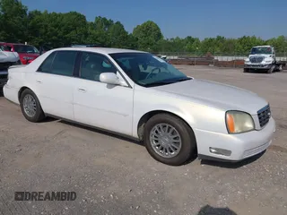 2004 Cadillac DeVille DHS z VIN 1G6KE57Y24U260694, wystawiony jako IAAI lot #42235533 z przebiegiem 156 689 mil mil oraz . Historia ofert i sprzedaży dostępna na DreamBid. Obrazek 1.