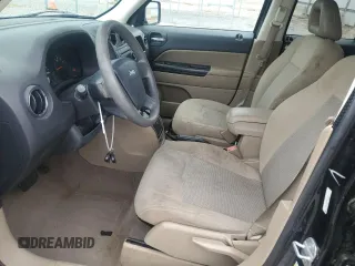 2009 Jeep Patriot Sport z VIN 1J4FT28B39D147223, wystawiony jako Copart lot #53913695 z przebiegiem 132 432 mil mil oraz Szkoda całkowita • Salvage title. Historia ofert i sprzedaży dostępna na DreamBid. Obrazek 7.