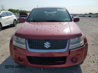 2012 Suzuki Grand Vitara Premium z VIN JS3TD0D60C4100503, wystawiony jako Copart lot #59050575 z przebiegiem 158 052 mil mil oraz Tytuł czysty. Historia ofert i sprzedaży dostępna na DreamBid. Obrazek 5.