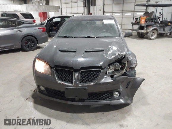2008 Pontiac G8 z VIN 6G2ER577X8L151778, wystawiony jako IAAI lot #41084344 z przebiegiem 145 990 mil mil oraz . Historia ofert i sprzedaży dostępna na DreamBid. Obrazek 12.