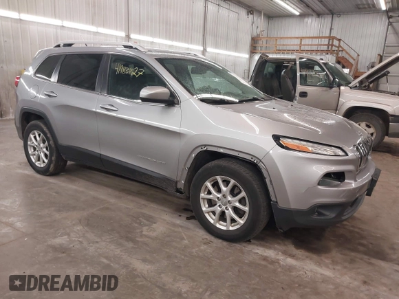 2014 Jeep Cherokee Altitude with VIN 1C4PJMCB9EW149754, listed as a IAAI auction lot 41983427 with 199,810 mi miles and . Bid and sale history available at DreamBid. Image 1.