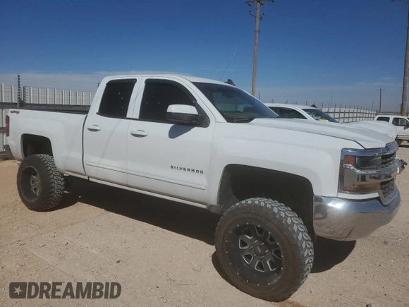 2018 Chevrolet Silverado 1500 LT with VIN 1GCVKRECXJZ313819, listed as a Copart auction lot 49056335 with 114,991 mi miles and Salvage Title. Bid and sale history available at DreamBid. Image 4.