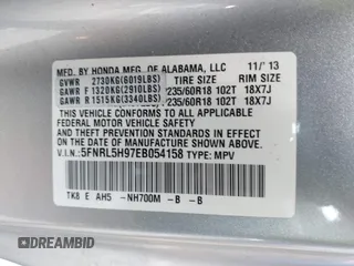2014 Honda Odyssey Touring with VIN 5FNRL5H97EB054158, listed as a IAAI auction lot 42548360 with 91,161 mi miles and . Bid and sale history available at DreamBid. Image 9.