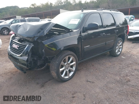2012 GMC Yukon SLT with VIN 1GKS1CE06CR104447, listed as a IAAI auction lot 41589823 with 183,003 mi miles. Bid and sale history available at carsss.com. Image 2.