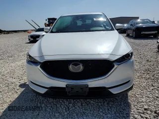 2018 Mazda CX-5 Touring with VIN JM3KFACM6J1301189, listed as a Copart auction lot 58255024 with 85,052 mi miles and Clean Title. Bid and sale history available at carsss.com. Image 5.