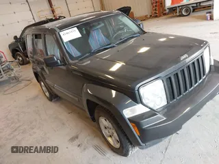 2011 Jeep Liberty Sport Jet z VIN 1J4PN2GKXBW593489, wystawiony jako IAAI lot #42463151 z przebiegiem 246 672 mil mil oraz . Historia ofert i sprzedaży dostępna na DreamBid. Obrazek 1.
