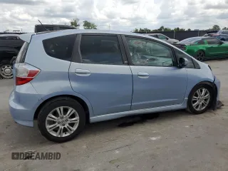 2010 Honda Fit Sport with VIN JHMGE8H64AC032634, listed as a Copart auction lot 61795825 with 143,593 mi miles and Salvage title. Bid and sale history available at DreamBid. Image 3.
