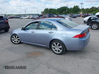 2004 Acura TSX w/Navigation with VIN JH4CL96944C045735, listed as a IAAI auction lot 42042197 with 197,900 mi miles. Bid and sale history available at carsss.com. Image 3.