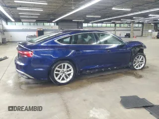 2023 Audi A5 Sportback S line Premium z VIN WAUDACF50PA054600, wystawiony jako Copart lot #56216885 z przebiegiem 23 802 mil mil oraz Szkoda całkowita • Salvage title. Historia ofert i sprzedaży dostępna na DreamBid. Obrazek 3.