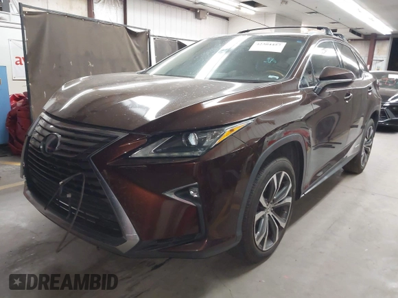 2016 Lexus RX 450h with VIN 2T2BGMCA1GC005462, listed as a IAAI auction lot 42304457 with 87,248 mi miles and . Bid and sale history available at DreamBid. Image 17.