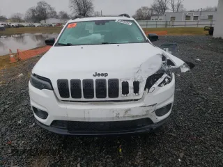 2022 Jeep Cherokee X with VIN 1C4PJMCX9ND527482, listed as a Copart auction lot 85089294 with 33,015 mi miles and Salvage Title. Bid and sale history available at carsss.com. Image 5.