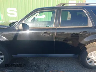 2010 Mazda Tribute Sport with VIN 4F2CY9C74AKM03679, listed as a IAAI auction lot 41740156 with 142,208 mi miles and . Bid and sale history available at DreamBid. Image 14.