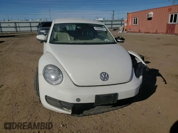 2012 Volkswagen Beetle 2.5L w/Sound/Nav PZEV with VIN 3VWJP7AT4CM657836, listed as a Copart auction lot 43065845 with 96,854 mi miles and Salvage Title. Bid and sale history available at DreamBid. Image 11.