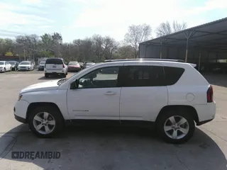 2014 Jeep Compass Sport with VIN 1C4NJDBB2ED774078, listed as a IAAI auction lot 42038110 with 104,606 mi miles. Bid and sale history available at carsss.com. Image 15.