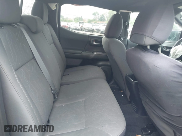 2017 Toyota Tacoma SR5 with VIN 3TMCZ5ANXHM089093, listed as a IAAI auction lot 42513711 with 86,022 mi miles and . Bid and sale history available at DreamBid. Image 8.