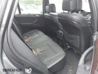 2011 BMW X5 35i with VIN 5UXZV4C58BL410570, listed as a IAAI auction lot 41886238 with 164,192 mi miles. Bid and sale history available at carsss.com. Image 8.