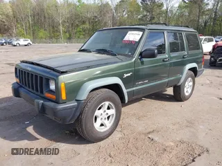 1998 Jeep Cherokee Sport with VIN 1J4FT68S8WL131348, listed as a IAAI auction lot 41912540 with 111,579 mi miles. Bid and sale history available at carsss.com. Image 2.