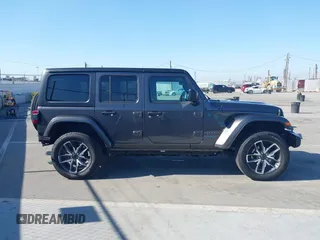 2024 Jeep Wrangler Sport S with VIN 1C4RJXN61RW192386, listed as a IAAI auction lot 42001810 with 7,426 mi miles and . Bid and sale history available at DreamBid. Image 13.