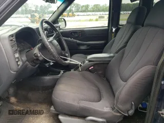 2003 GMC Sonoma SLS with VIN 1GTCS19X038195293, listed as a Copart auction lot 65954784 with 158,589 mi miles and Salvage Title. Bid and sale history available at carsss.com. Image 7.