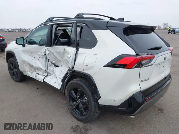 2021 Toyota RAV4 Hybrid XSE with VIN 2T3E6RFV4MW021009, listed as a IAAI auction lot 41940278 with 33,016 mi miles and . Bid and sale history available at DreamBid. Image 3.