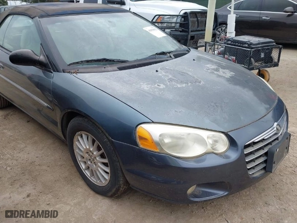 2002 Chrysler Sebring Limited with VIN 1C3EL65R72N201668, listed as a IAAI auction lot 41018612 with 143,931 mi miles. Bid and sale history available at carsss.com. Image 12.
