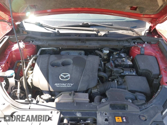 2014 Mazda CX-5 Touring with VIN JM3KE2CY2E0374440, listed as a IAAI auction lot 41634144 with 106,145 mi miles and . Bid and sale history available at DreamBid. Image 10.