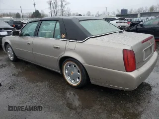 2004 Cadillac DeVille DTS z VIN 1G6KF57944U117834, wystawiony jako Copart lot #89320975 z przebiegiem 149 820 mil mil oraz Szkody całkowita. Historia ofert i sprzedaży dostępna na DreamBid. Obrazek 2.