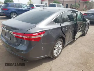 2014 Toyota Avalon Limited with VIN 4T1BK1EB1EU101787, listed as a IAAI auction lot 41949977 with 137,837 mi miles. Bid and sale history available at carsss.com. Image 4.
