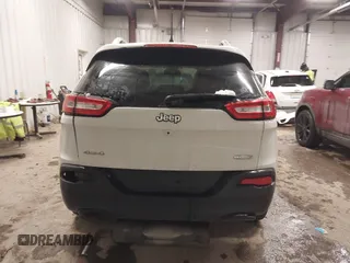 2016 Jeep Cherokee Latitude with VIN 1C4PJMCB1GW119621, listed as a IAAI auction lot 41310872 with 123,841 mi miles. Bid and sale history available at carsss.com. Image 16.