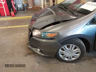 2010 Honda Insight LX with VIN JHMZE2H54AS040316, listed as a IAAI auction lot 41572246 with 142,850 mi miles and . Bid and sale history available at DreamBid. Image 6.
