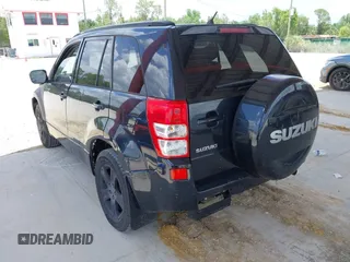 2006 Suzuki Grand Vitara Luxury z VIN JS3TD947664104590, wystawiony jako IAAI lot #42473110 z przebiegiem 146 715 mil mil oraz . Historia ofert i sprzedaży dostępna na DreamBid. Obrazek 3.