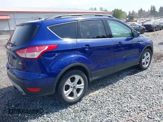 2014 Ford Escape SE with VIN 1FMCU9GX1EUA01050, listed as a IAAI auction lot 42099229 with Not Provided miles and . Bid and sale history available at carsss.com. Image 4.
