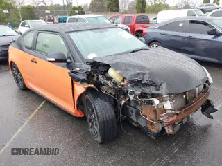 2015 Scion tC with VIN JTKJF5C79FJ007842, listed as a IAAI auction lot 41560881 with 155,436 mi miles. Bid and sale history available at carsss.com. Image 1.