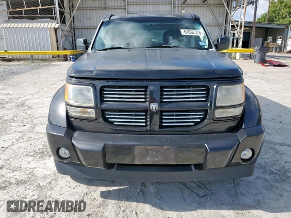 2011 Dodge Nitro Heat with VIN 1D4PT4GKXBW607823, listed as a Copart auction lot 64602325 with 107,666 mi miles and Clean title. Bid and sale history available at DreamBid. Image 5.