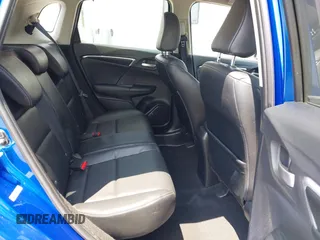 2016 Honda Fit EX-L with VIN JHMGK5H84GS008857, listed as a IAAI auction lot 42589888 with 100,701 mi miles and . Bid and sale history available at DreamBid. Image 8.