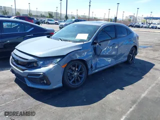 2020 Honda Civic Hatchback EX-L with VIN SHHFK7H82LU406602, listed as a IAAI auction lot 41711261 with 102,464 mi miles. Bid and sale history available at carsss.com. Image 17.