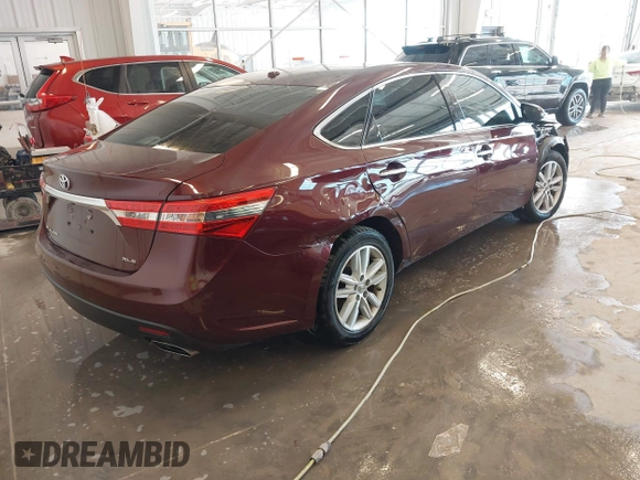 2015 Toyota Avalon Limited with VIN 4T1BK1EB8FU187603, listed as a IAAI auction lot 41633899 with 94,825 mi miles and . Bid and sale history available at DreamBid. Image 4.