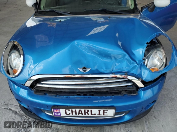 2011 MINI Hardtop with VIN WMWSU3C52BT252207, listed as a Copart auction lot 62735905 with 121,121 mi miles and Salvage title. Bid and sale history available at DreamBid. Image 11.