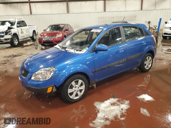 2009 Kia Rio LX with VIN KNADE243196505992, listed as a Copart auction lot 46054315 with 118,647 mi miles and Clean Title. Bid and sale history available at carsss.com. Image 1.