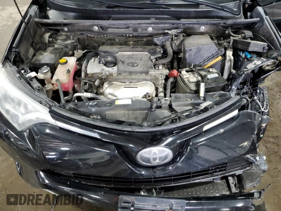 2018 Toyota RAV4 LE with VIN 2T3BFREV6JW763007, listed as a Copart auction lot 58604545 with 107,683 mi miles and Salvage title. Bid and sale history available at DreamBid. Image 12.